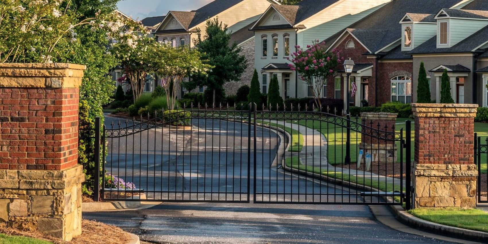 Typical fresh new gated community entrance in United States sout Stock_Gates