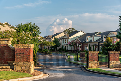 Typical fresh new gated community entrance in United States sout Rotadyne-Sydney-Wastewater-Packaged-Pumping-Station-Engineered-Systems-Municipal-Gated-Communities-Application